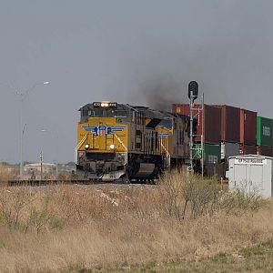 UP 8332 leads a WB doublestack near Midland, TX