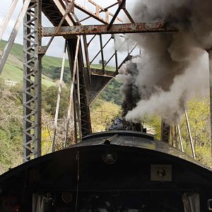 2472 making smoke across a truss bridge