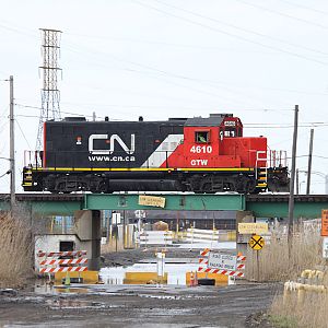 CN light power GP9R on X - E.J. & E line @ Pine Jct