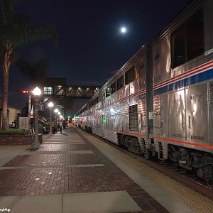 Station Stop Under an Autumn Moon for the Eastbound Southwest Chief at Full