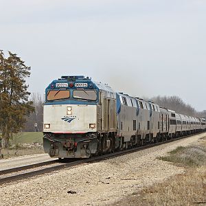 Capital Limited and Lake Shore Limited with Amtrak NPCU 90225 on point pass