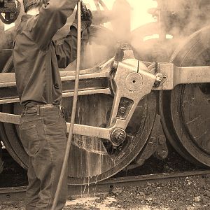 Guy steam cleaning steam