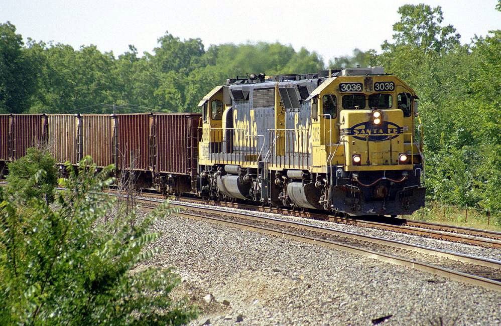 GP40X leads empty rock train.